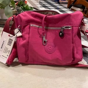 Beautiful Kipling crossbody purse. New with tags.